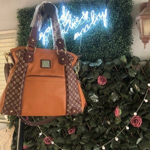 New with tags Jose Hess large bag. Never used.